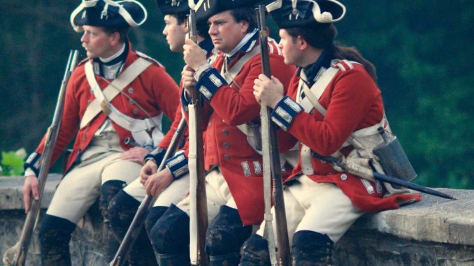 American revolutionary soldiers sitting and chatting American revolutionary soldiers sitting and chatting